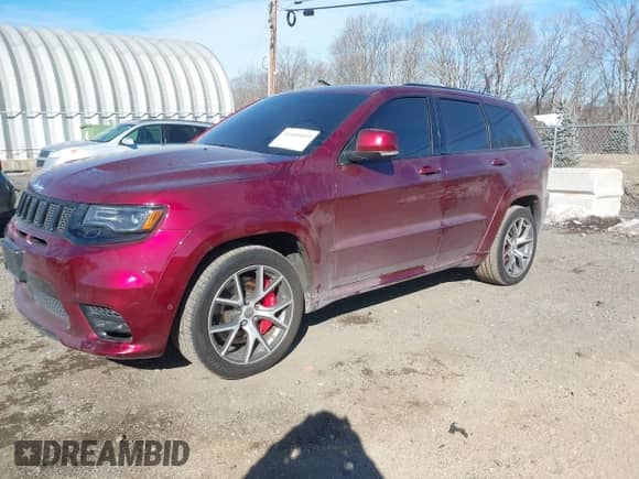 2017 Jeep Grand Cherokee SRT with VIN 1C4RJFDJ1HC754559, listed as a IAAI auction lot 41461029 with 100,096 mi miles and . Bid and sale history available at DreamBid. Image 2.
