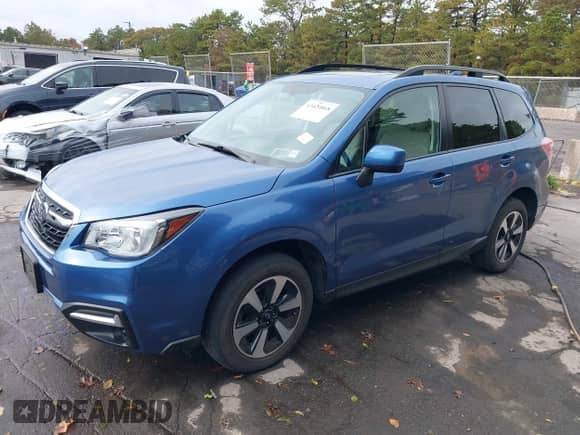 2018 Subaru Forester Premium z VIN JF2SJAEC6JH426553, wystawiony jako IAAI lot #43420868 z przebiegiem 43 531 mil mil oraz . Historia ofert i sprzedaży dostępna na DreamBid. Obrazek 17.