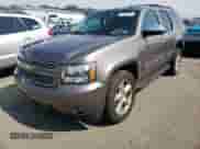 2013 Chevrolet Tahoe LS with VIN 1GNSKAE01DR202100, listed as a Copart auction lot 57896221 with 107,509 mi miles and Salvage title. Bid and sale history available at DreamBid. Image 2.