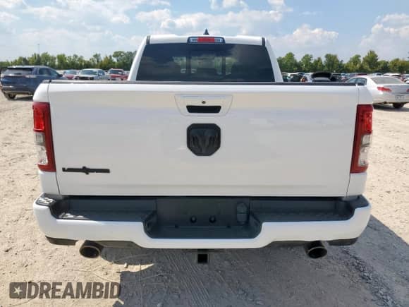 2022 Ram 1500 Lone Star z VIN 1C6RREBT7NN173310, wystawiony jako Copart lot #84950525 z przebiegiem 20 514 mil mil oraz Szkoda całkowita • Salvage title. Historia ofert i sprzedaży dostępna na DreamBid. Obrazek 6.