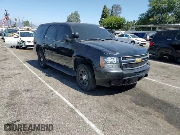 2013 Chevrolet Tahoe Commercial with VIN 1GNLC2E00DR256429, listed as a Copart auction lot 67590515 with Not provided miles and Salvage title. Bid and sale history available at DreamBid. Image 14.