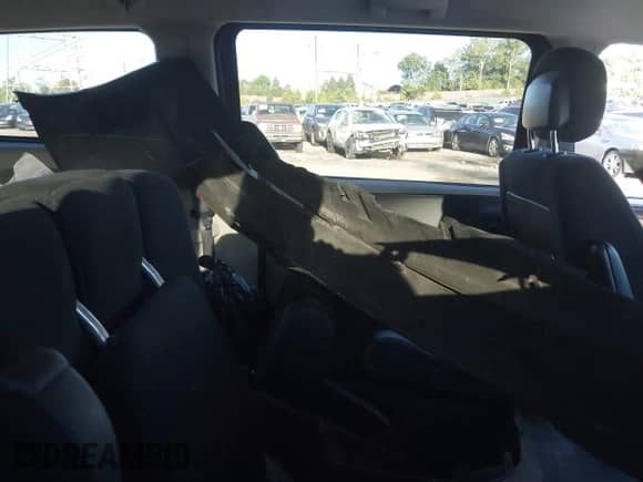 2016 Dodge Grand Caravan SXT with VIN 2C4RDGCG4GR161335, listed as a IAAI auction lot 43414142 with 124,679 mi miles and . Bid and sale history available at DreamBid. Image 8.