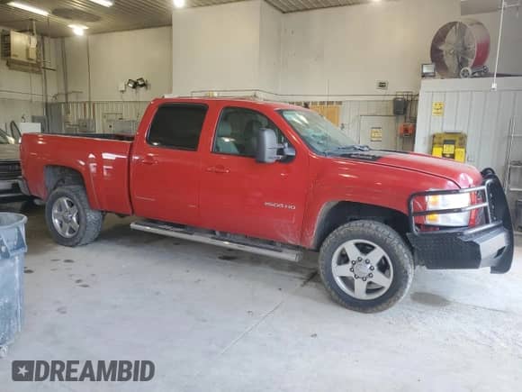 2012 Chevrolet Silverado 2500HD LT with VIN 1GC1KXCG7CF182202, listed as a Copart auction lot 56857925 with 172,950 mi miles and Salvage title. Bid and sale history available at DreamBid. Image 4.