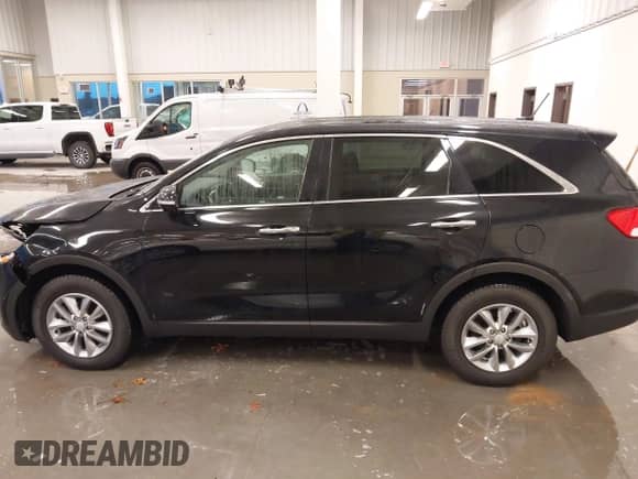 2018 Kia Sorento LX with VIN 5XYPG4A33JG412399, listed as a IAAI auction lot 40715313 with 95,269 mi miles and . Bid and sale history available at DreamBid. Image 14.