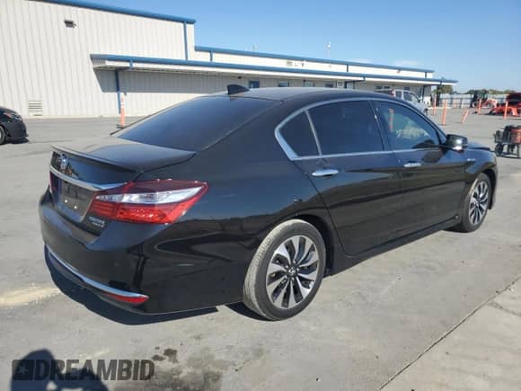 2017 Honda Accord Touring with VIN JHMCR6F71HC003038, listed as a Copart auction lot 69660985 with 135,588 mi miles and Salvage title. Bid and sale history available at DreamBid. Image 3.