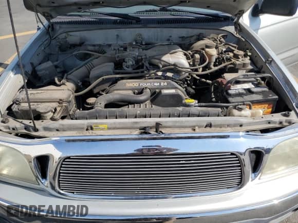 2001 Toyota Tacoma PreRunner с VIN 5TEGN92N71Z814712, выставлен на аукционе Copart как лот 65134275 с пробегом 143 238 миль миль и Списание • Salvage title. История ставок и продаж доступна на DreamBid. Изображение 11.