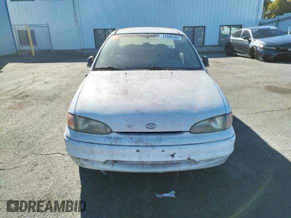 1997 Hyundai Accent GL z VIN KMHVF24NXVU373676, wystawiony jako Copart lot #77866484 z przebiegiem 151 949 mil mil oraz Czysty tytuł • Clean title. Historia ofert i sprzedaży dostępna na DreamBid. Obrazek 5.