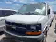 2014 Chevrolet Express Cargo with VIN 1GCSGAFX3E1163645, listed as a IAAI auction lot 42621079 with 251,814 mi miles and . Bid and sale history available at DreamBid. Image 2.