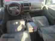 2006 Nissan Frontier SE with VIN 1N6AD07UX6C421343, listed as a Copart auction lot 81951935 with 216,374 mi miles and Salvage title. Bid and sale history available at DreamBid. Image 8.