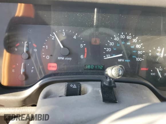 1999 Jeep Wrangler Sport with VIN 1J4FY19SXXP412760, listed as a Copart auction lot 84983895 with 180,172 mi miles and Clean title. Bid and sale history available at DreamBid. Image 9.