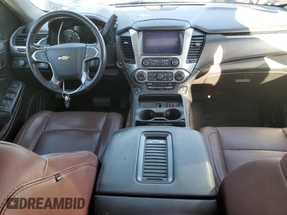 2019 Chevrolet Suburban Premier с VIN 1GNSKJKJXKR323704, выставлен на аукционе Copart как лот 72757214 с пробегом 150 404 миль миль и Списание • Salvage title. История ставок и продаж доступна на DreamBid. Изображение 8.