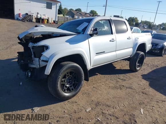 2022 Toyota Tacoma TRD Off Road with VIN 3TYCZ5AN5NT091043, listed as a IAAI auction lot 43286414 with 30,864 mi miles and . Bid and sale history available at DreamBid. Image 17.