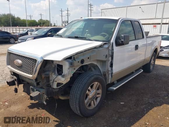 2007 Ford F-150 XL with VIN 1FTPX12V87FA59006, listed as a IAAI auction lot 43199548 with 206,620 mi miles and . Bid and sale history available at DreamBid. Image 2.
