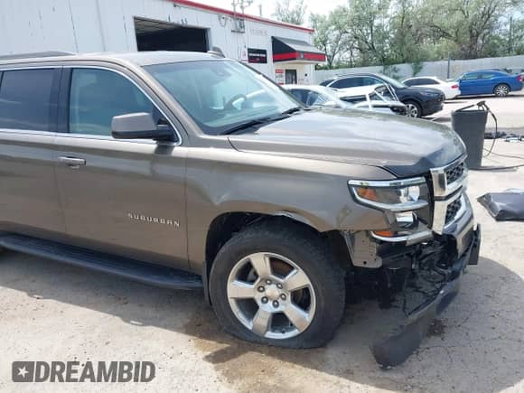 2016 Chevrolet Suburban LT with VIN 1GNSKHKC9GR275615, listed as a IAAI auction lot 42296718 with 91,853 mi miles and . Bid and sale history available at DreamBid. Image 18.