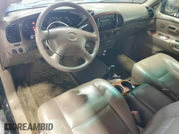 2001 Toyota Tundra Limited z VIN 5TBBT48141S154805, wystawiony jako Copart lot #66225125 z przebiegiem 216 119 mil mil oraz Czysty tytuł • Clean title. Historia ofert i sprzedaży dostępna na DreamBid. Obrazek 8.