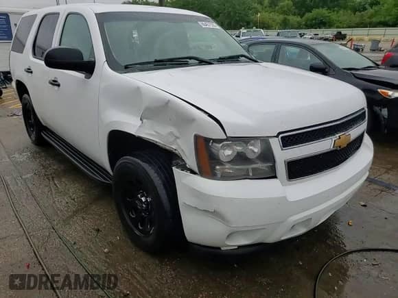 2012 Chevrolet Tahoe Commercial с VIN 1GNLC2E00CR292409, выставлен на аукционе Copart как лот 66457525 с пробегом 141 547 миль миль и Списание • Salvage title. История ставок и продаж доступна на DreamBid. Изображение 15.