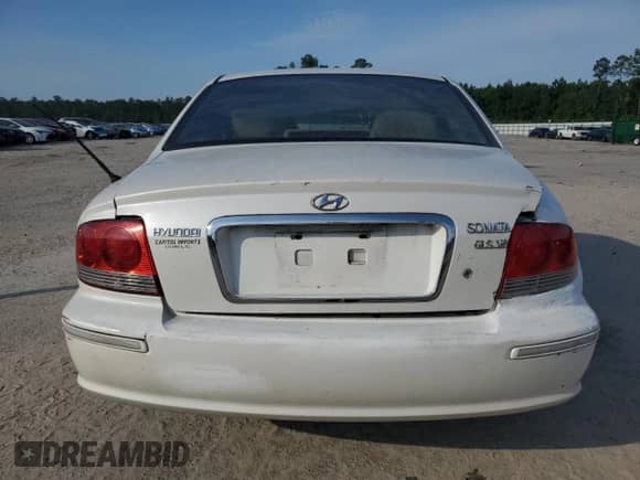 2002 Hyundai Sonata GLS z VIN KMHWF35HX2A552641, wystawiony jako Copart lot #57324655 z przebiegiem 274 808 mil mil oraz Szkoda całkowita • Salvage title. Historia ofert i sprzedaży dostępna na DreamBid. Obrazek 6.