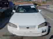 1997 Toyota Camry LE z VIN 4T1BF22K8VU903719, wystawiony jako IAAI lot #43385700 z przebiegiem 260 820 mil mil oraz . Historia ofert i sprzedaży dostępna na DreamBid. Obrazek 12.