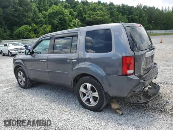 2014 Honda Pilot EX-L with VIN 5FNYF3H53EB013613, listed as a Copart auction lot 64211105 with 282,333 mi miles and Salvage title. Bid and sale history available at DreamBid. Image 2.