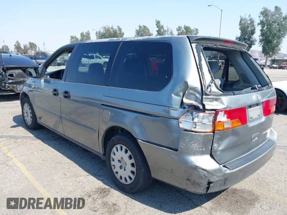 2002 Honda Odyssey LX with VIN 2HKRL18582H553425, listed as a IAAI auction lot 42691711 with 272,751 mi miles and . Bid and sale history available at DreamBid. Image 3.