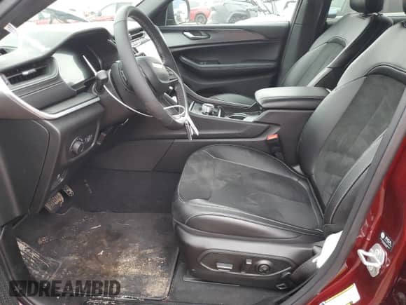 2025 Jeep Grand Cherokee Laredo with VIN 1C4RJHAG3SC274891, listed as a Copart auction lot 86952254 with 1,392 mi miles and Salvage title. Bid and sale history available at DreamBid. Image 7.