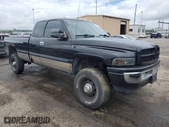 2000 Dodge 2500 with VIN 1B7KF236XYJ132868, listed as a Copart auction lot 62901995 with 266,071 mi miles and Salvage title. Bid and sale history available at DreamBid. Image 4.