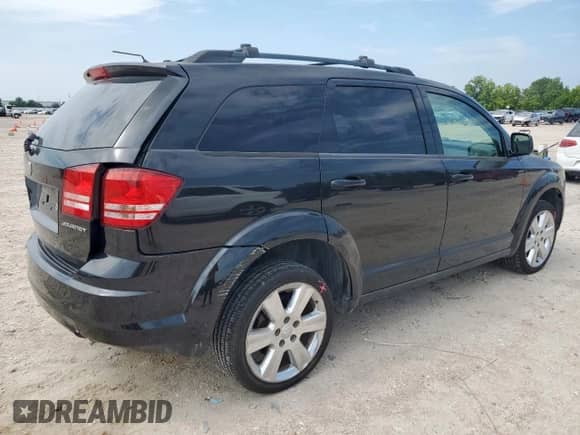 2009 Dodge Journey SE z VIN 3D4GG47B99T517020, wystawiony jako Copart lot #69597755 z przebiegiem 176 638 mil mil oraz Szkoda całkowita • Salvage title. Historia ofert i sprzedaży dostępna na DreamBid. Obrazek 3.