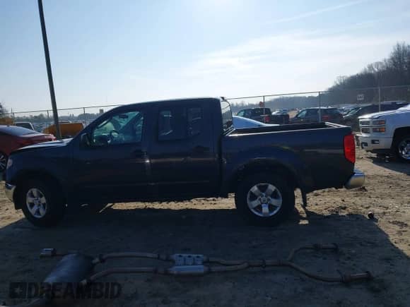 2010 Nissan Frontier Pro-4X with VIN 1N6AD0EV8AC424200, listed as a IAAI auction lot 41510402 with 264,111 mi miles and . Bid and sale history available at DreamBid. Image 14.