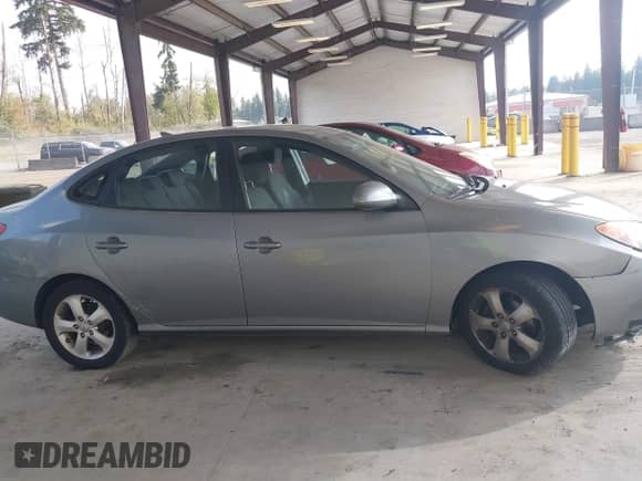 2010 Hyundai Elantra GLS z VIN KMHDU4AD1AU163017, wystawiony jako IAAI lot #43189615 z przebiegiem 177 100 mil mil oraz . Historia ofert i sprzedaży dostępna na DreamBid. Obrazek 13.