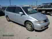 2002 Honda Odyssey EX с VIN 2HKRL18662H550211, выставлен на аукционе Copart как лот 69511255 с пробегом 146 865 миль миль и Списание • Salvage title. История ставок и продаж доступна на DreamBid. Изображение 4.