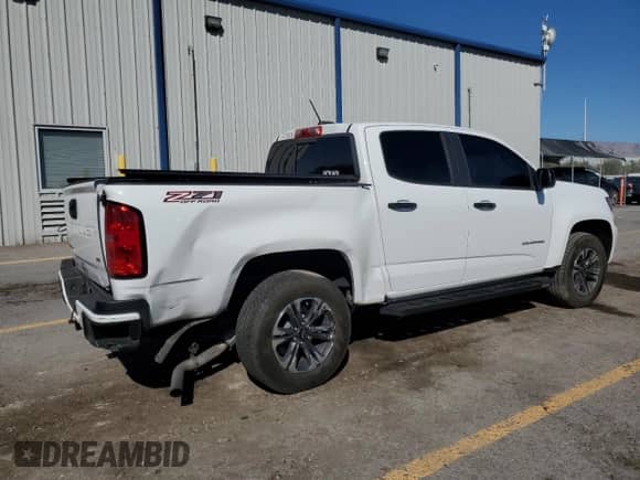 2021 Chevrolet Colorado 4WD Z71 with VIN 1GCGTDEN5M1111953, listed as a Copart auction lot 83876635 with 51,302 mi miles and Salvage title. Bid and sale history available at DreamBid. Image 3.
