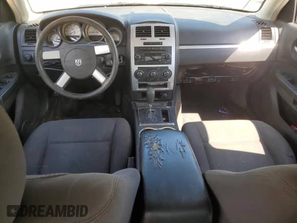 2010 Dodge Charger SXT z VIN 2B3CA3CV1AH257542, wystawiony jako Copart lot #71813644 z przebiegiem 164 672 mil mil oraz Szkoda całkowita • Salvage title. Historia ofert i sprzedaży dostępna na DreamBid. Obrazek 8.