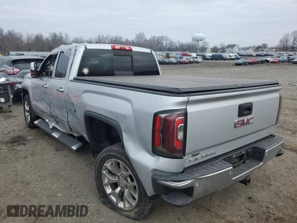 2017 GMC Sierra 1500 SLT z VIN 1GTV2NEJ3HZ300489, wystawiony jako Copart lot #88165705 z przebiegiem 97 878 mil mil oraz Szkoda całkowita • Salvage title. Historia ofert i sprzedaży dostępna na DreamBid. Obrazek 2.