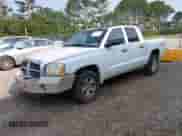 2006 Dodge Dakota SLT с VIN 1D7HW48N06S537236, выставлен на аукционе IAAI как лот 42394061 с пробегом 239 091 миль миль и . История ставок и продаж доступна на DreamBid. Изображение 2.