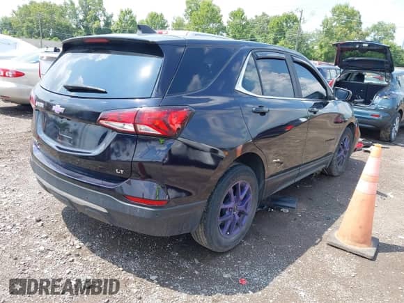 2022 Chevrolet Equinox LT with VIN 3GNAXKEV0NL173048, listed as a IAAI auction lot 42976282 with 83,097 mi miles and . Bid and sale history available at DreamBid. Image 4.