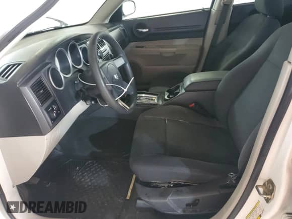 2006 Dodge Magnum z VIN 2D4FV47V36H436837, wystawiony jako Copart lot #70883025 z przebiegiem 206 603 mil mil oraz Szkoda całkowita • Salvage title. Historia ofert i sprzedaży dostępna na DreamBid. Obrazek 7.