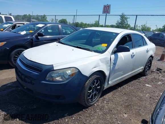 2011 Chevrolet Malibu 1LS with VIN 1G1ZB5E15BF170024, listed as a IAAI auction lot 42646592 with 133,300 mi miles and . Bid and sale history available at DreamBid. Image 17.
