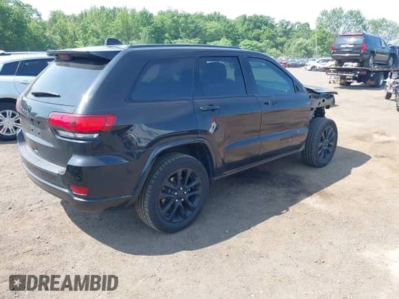 2020 Jeep Grand Cherokee Laredo E with VIN 1C4RJFAG3LC208766, listed as a IAAI auction lot 42475923 with 103,077 mi miles and . Bid and sale history available at DreamBid. Image 4.