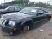 2006 Chrysler 300 C SRT-8 with VIN 2C3LA73W36H450317, listed as a IAAI auction lot 43148082 with 110,634 mi miles and . Bid and sale history available at DreamBid. Image 2.