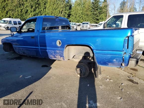 1999 Dodge 2500 with VIN 3B7KF26Z0XM566658, listed as a Copart auction lot 82927584 with Not provided miles and Salvage title. Bid and sale history available at DreamBid. Image 2.