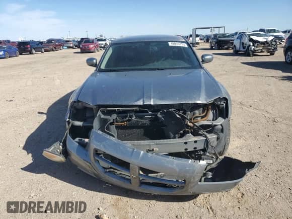 2006 Dodge Magnum SXT с VIN 2D8GZ47V86H288126, выставлен на аукционе Copart как лот 49919715 с пробегом 245 065 миль миль и Списание • Salvage title. История ставок и продаж доступна на DreamBid. Изображение 5.