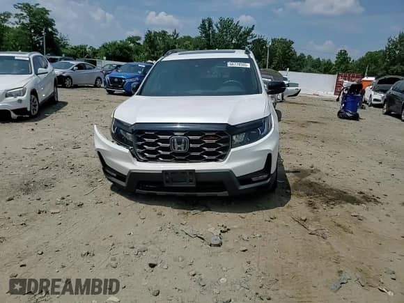 2023 Honda Passport TrailSport с VIN 5FNYF8H69PB023104, выставлен на аукционе Copart как лот 66778505 с пробегом 60 081 миль миль и Списание • Salvage title. История ставок и продаж доступна на DreamBid. Изображение 14.