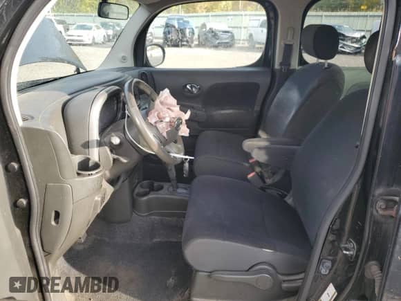 2012 Nissan Cube S с VIN JN8AZ2KR3CT250454, выставлен на аукционе Copart как лот 71648675 с пробегом 119 361 миль миль и Списание • Salvage title. История ставок и продаж доступна на DreamBid. Изображение 7.