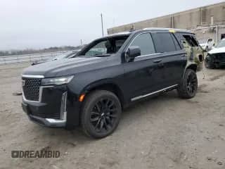 2021 Cadillac Escalade Premium Luxury with VIN 1GYS4BKL9MR215159, listed as a Copart auction lot 48577415 with 50,773 mi miles and Salvage title. Bid and sale history available at DreamBid. Image 1.