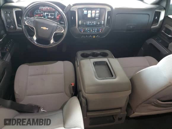 2018 Chevrolet Silverado 1500 LT with VIN 3GCUKREC9JG570580, listed as a Copart auction lot 69575445 with 106,245 mi miles and Salvage title. Bid and sale history available at DreamBid. Image 8.