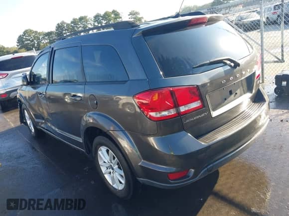 2014 Dodge Journey SXT with VIN 3C4PDCBB7ET160101, listed as a IAAI auction lot 43306893 with 179,383 mi miles and . Bid and sale history available at DreamBid. Image 3.