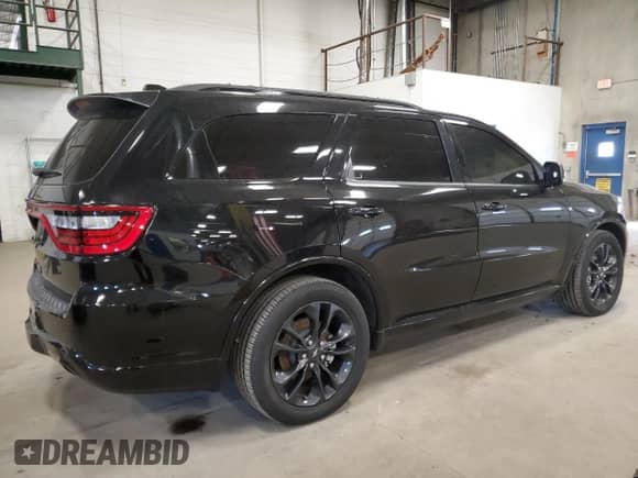 2024 Dodge Durango with VIN DPSMN181306, listed as a Copart auction lot 49079945 with 14,142 mi miles and Salvage title. Bid and sale history available at DreamBid. Image 3.