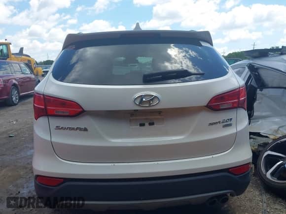 2014 Hyundai Santa Fe z VIN 5XYZUDLAXEG183108, wystawiony jako IAAI lot #42384854 z przebiegiem 160 963 mil mil oraz . Historia ofert i sprzedaży dostępna na DreamBid. Obrazek 17.