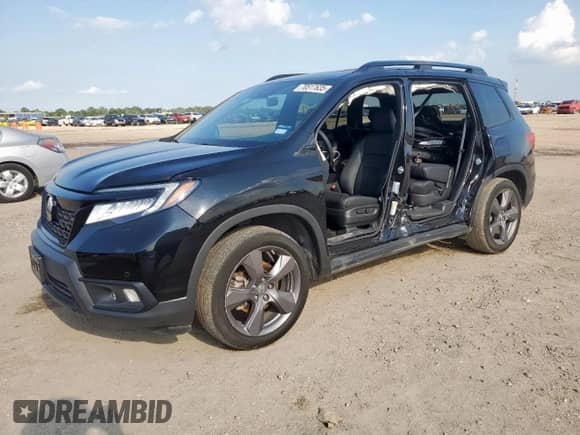 2021 Honda Passport Touring with VIN 5FNYF7H97MB014885, listed as a Copart auction lot 70517635 with 40,710 mi miles and Salvage title. Bid and sale history available at DreamBid. Image 1.