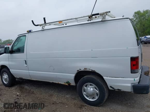 2012 Ford Econoline Cargo Recreational with VIN 1FTNE2EL7CDB36239, listed as a IAAI auction lot 42311374 with 152,547 mi miles and . Bid and sale history available at DreamBid. Image 14.